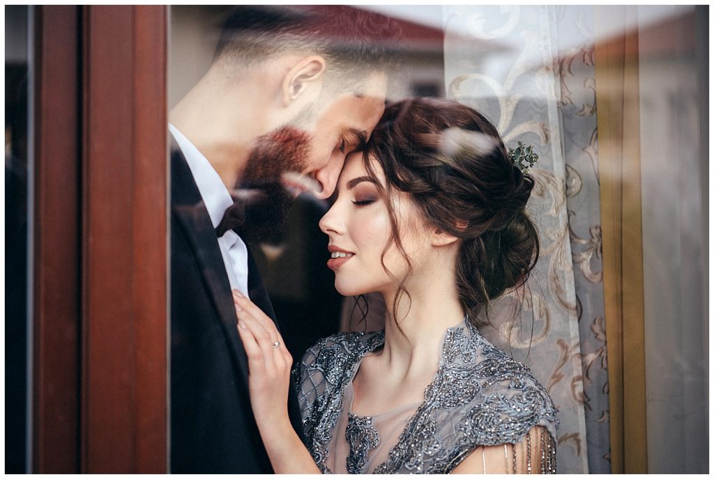 couple together in window
