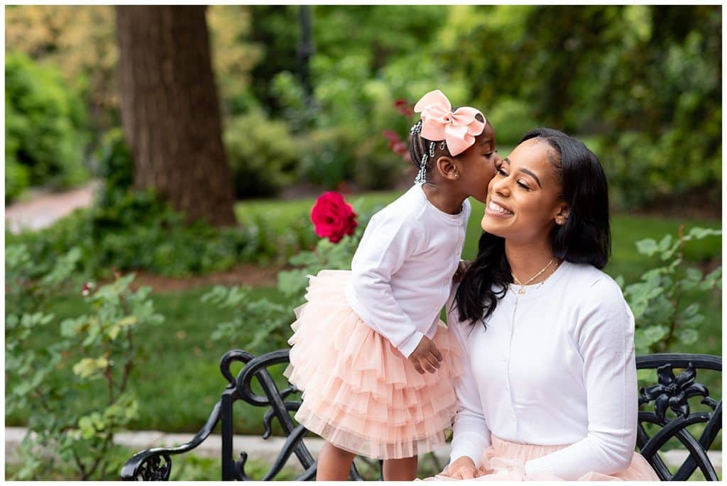 daughter kissing mom