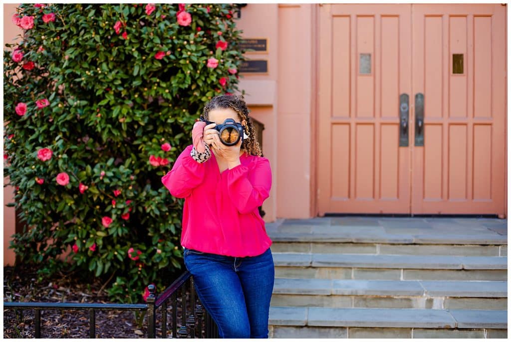woman holding camera