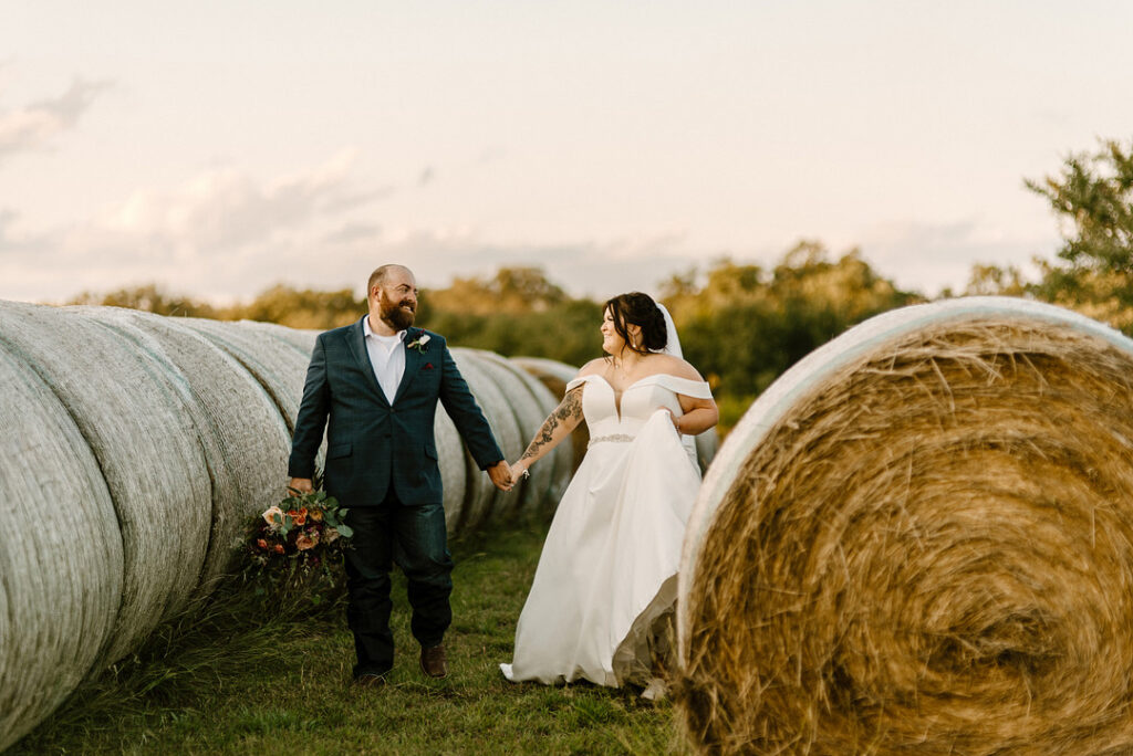 wedding couple hay field