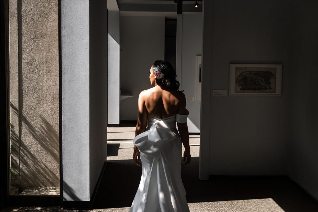 bride facing towards window