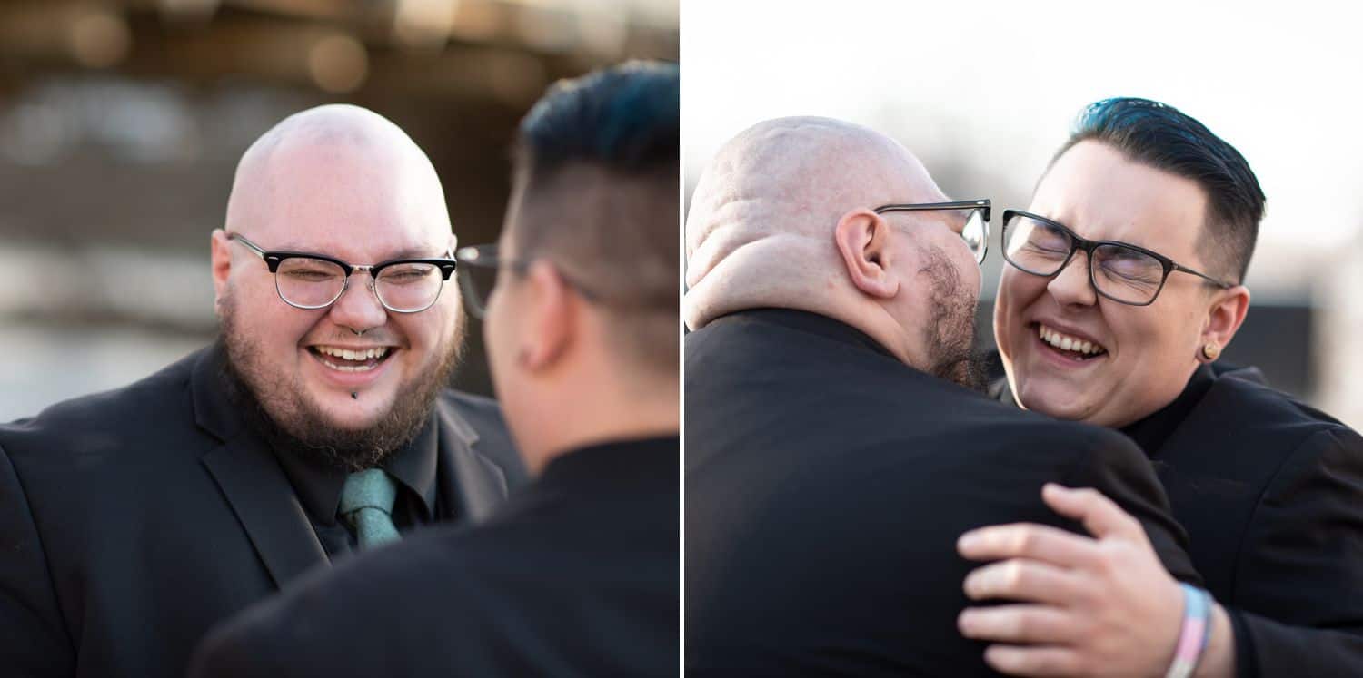 Two just-married husbands laugh and smile