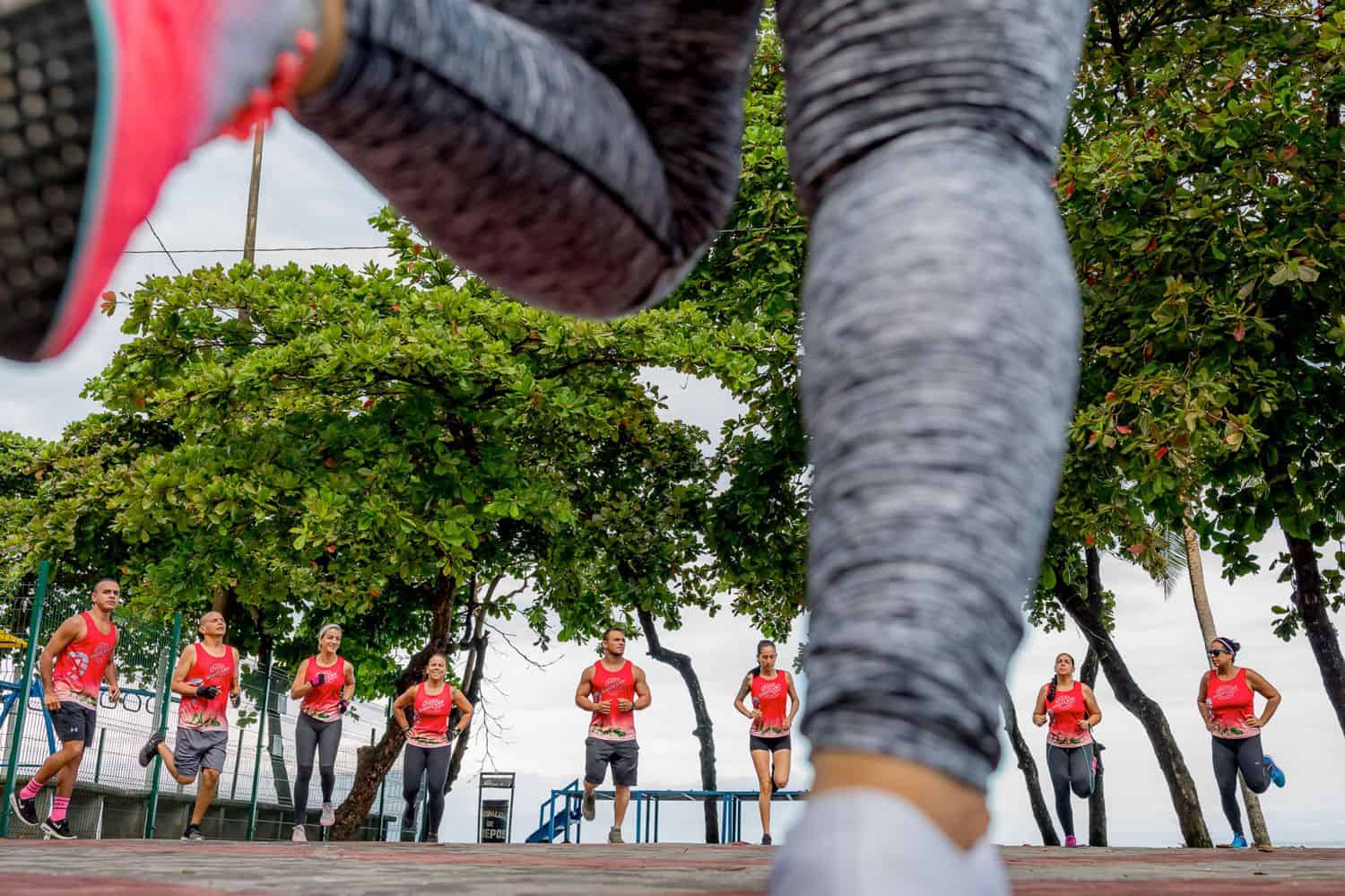 A group of people exercising together in an outdoor area