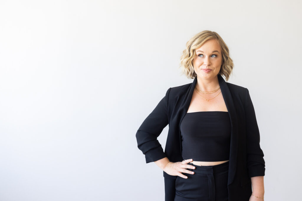 blonde woman dressed in black