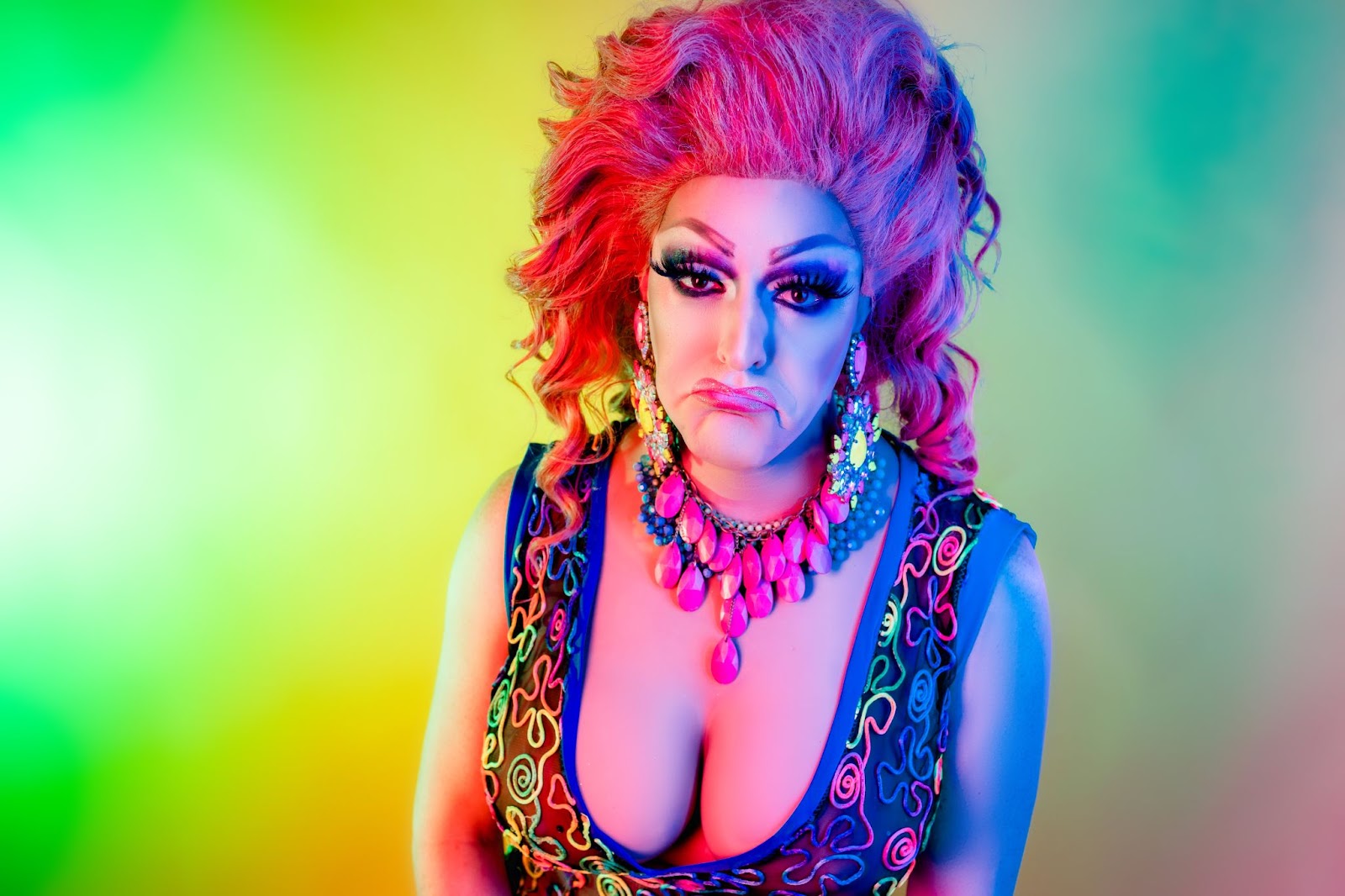 Rainbow photo of woman with glow in the dark clothes