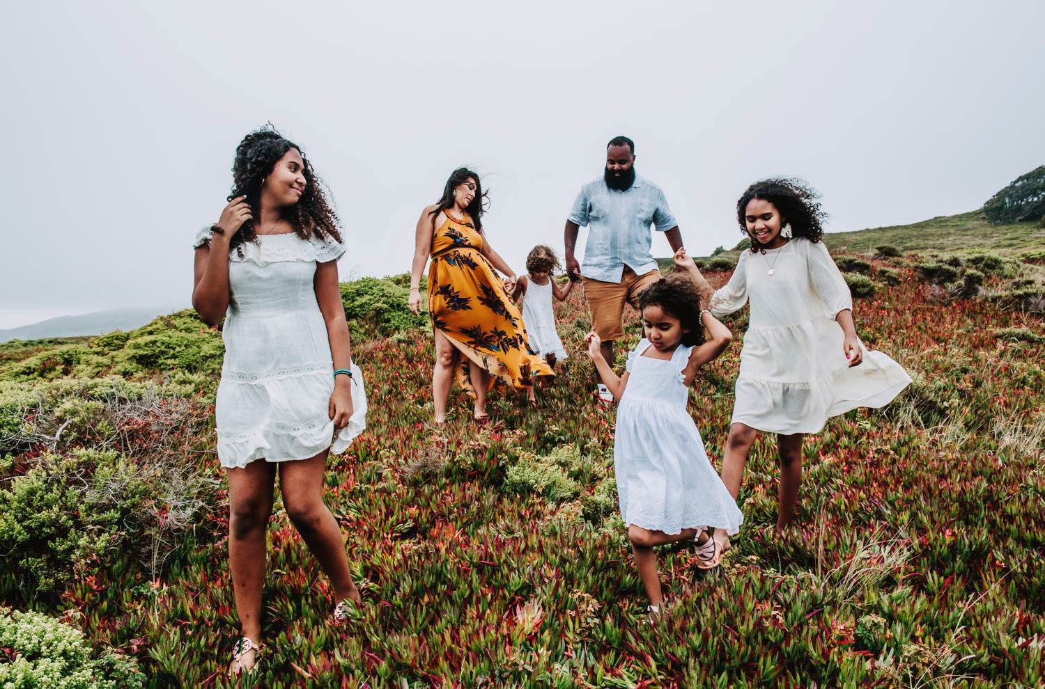 Captured Happiness Photography photographs a family in Hawaii as they anticipate the birth of their 5th child