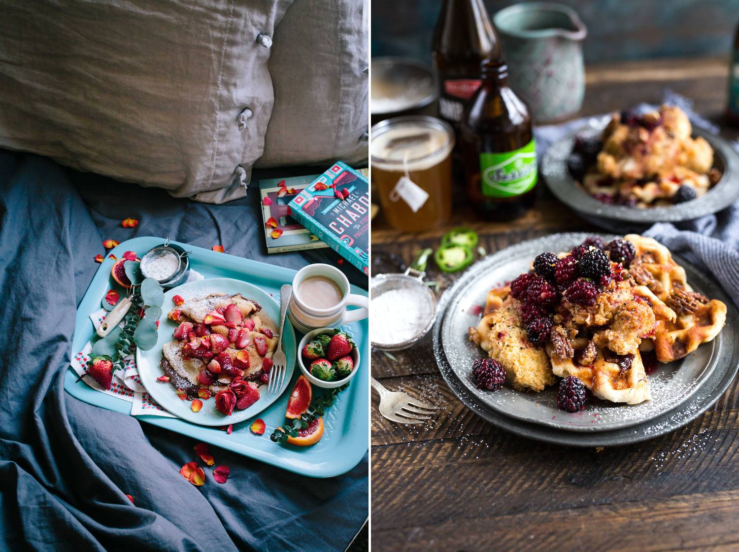 Breakfast foods are presented on a blue tray atop a linen duvet, and plated on white dishes against a wooden table.