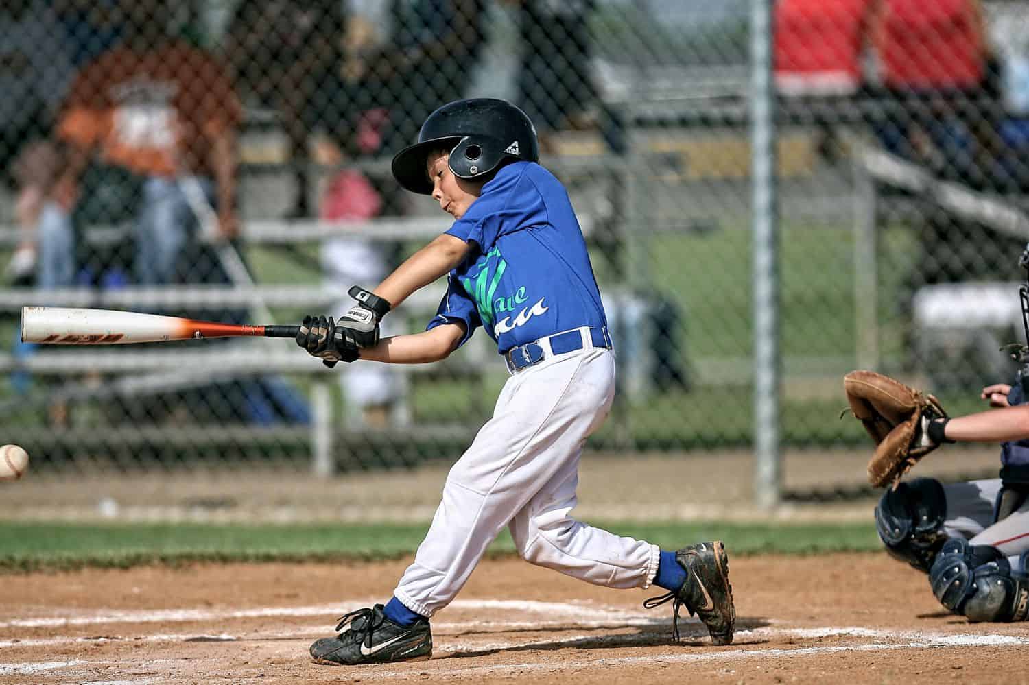 A young boy playing baseball