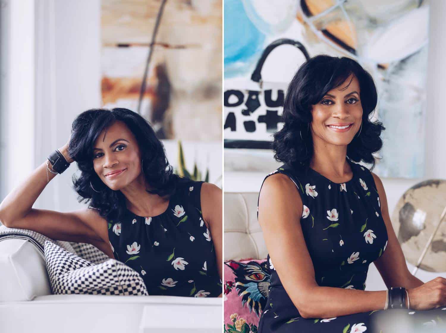 Two of Lauren Alexis' headshots are displayed side by side. In this series, a Latinx woman is photographed wearing a sleeveless, floral, navy blue dress. In the left image, she's sitting on a white leather couch with her elbow propped on the back of the sofa. In the right side image, she sits at a desk and appears prepared to work.