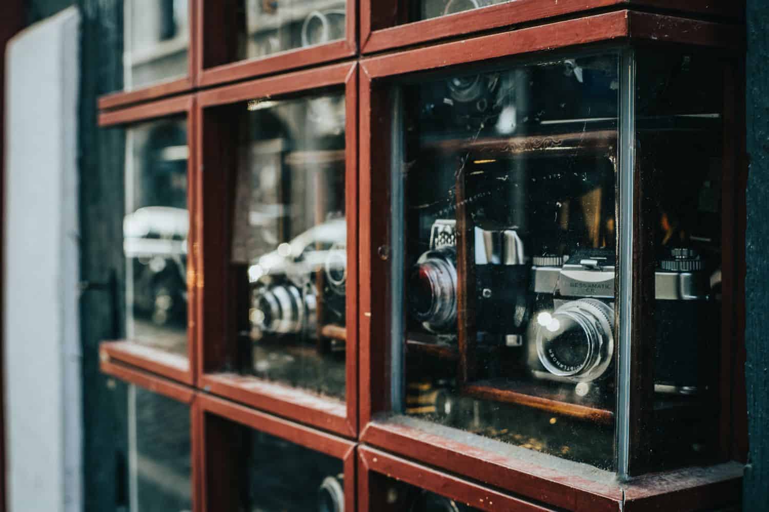 Lenses are displayed in a glass cabinet.