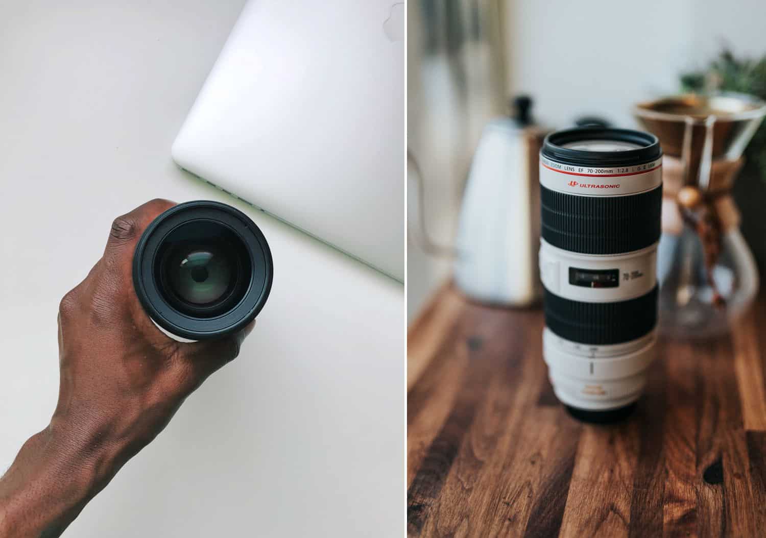 A hand holds a lens above a white table. A telephoto lens sits on a wooden table.