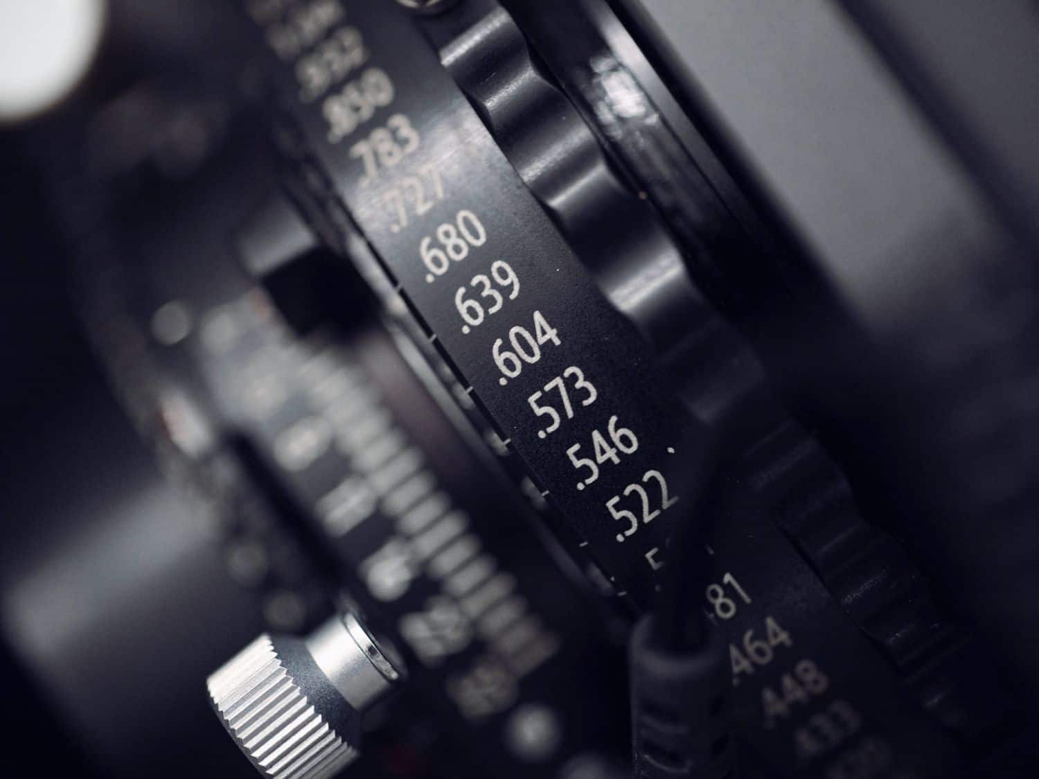 A close-up images of a lens focus ring.