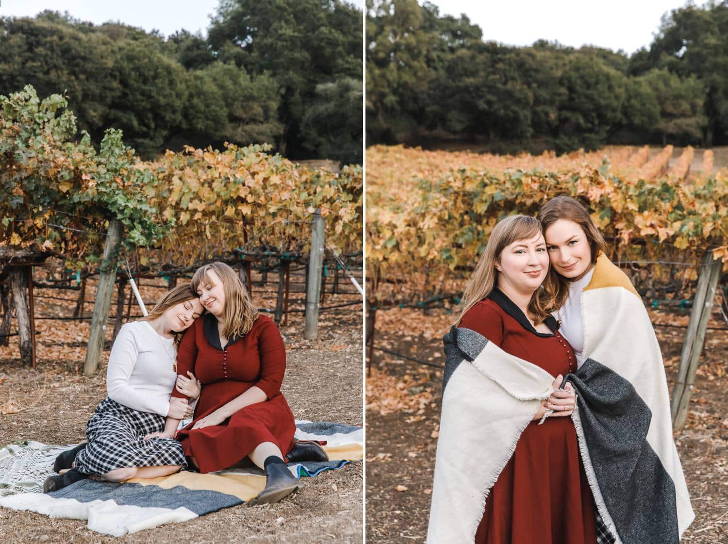 Two women enjoy a picnic at a vineyard