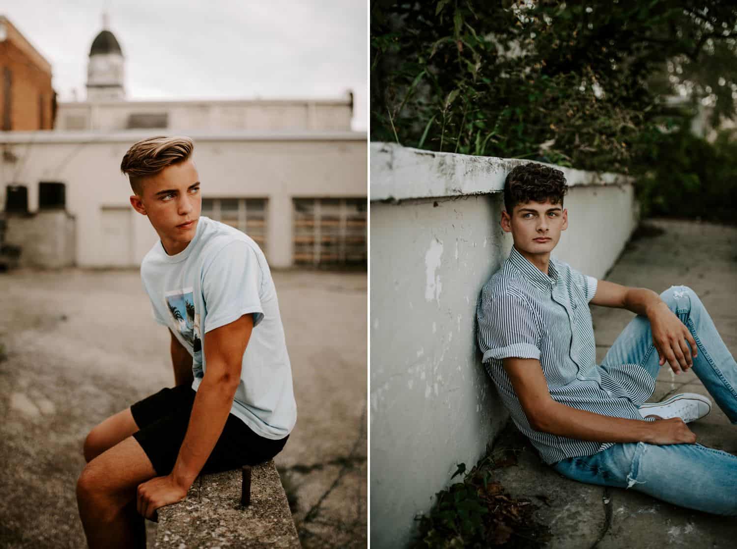 Teenage boys pose for pictures among old architecture under gray skies