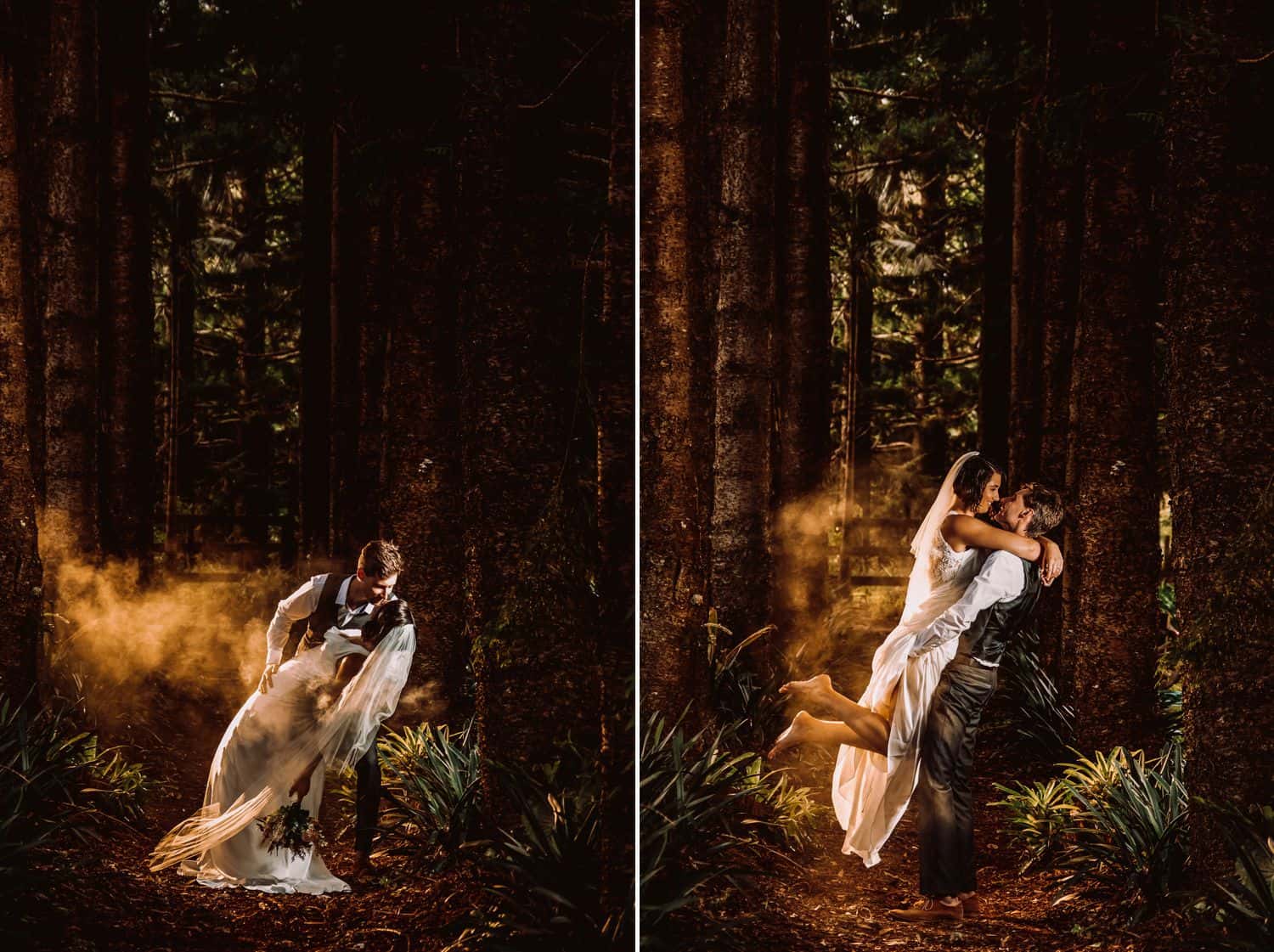Groom dips bride in a dark pine forest as gold smoke drifts around them. Groom lifts bride up and they kiss in a dark pine forest as gold smoke drifts around them.