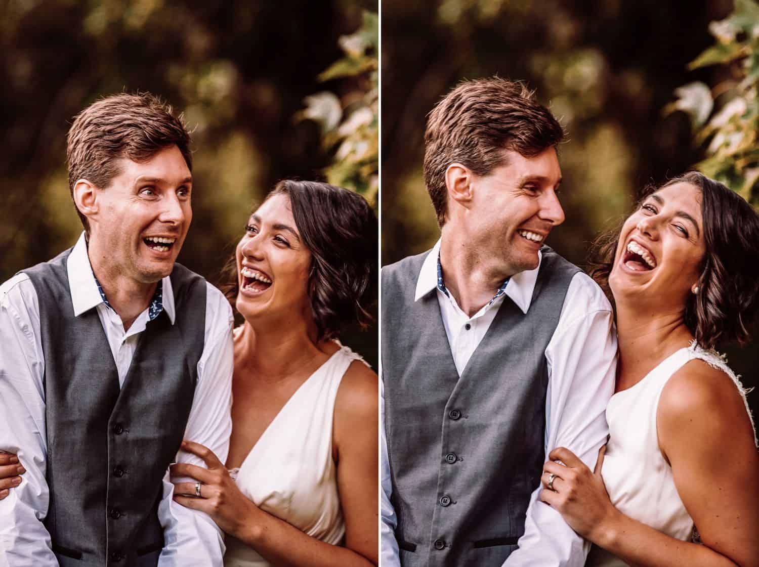 Laughing bride grabs groom from behind and he reacts with surprise. Laughing groom looks at bride as she laughs looking at the camera.