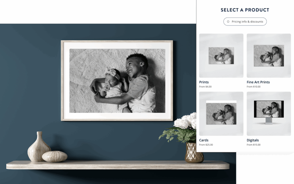 Framed black and white photo: older child holding a baby. Pricing for prints, fine art prints, cards, and digital download...