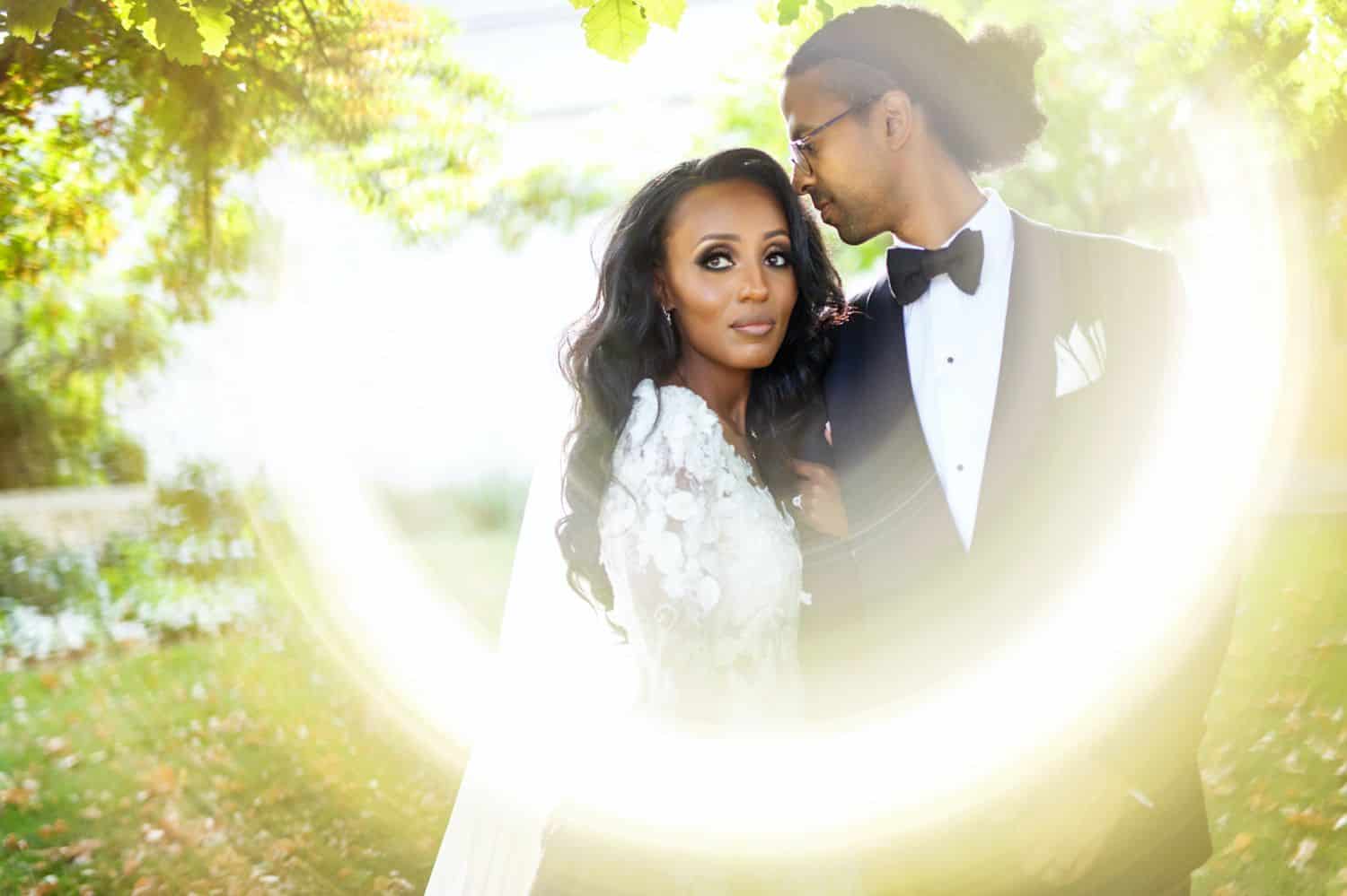Bride and groom photographed through a circular prism