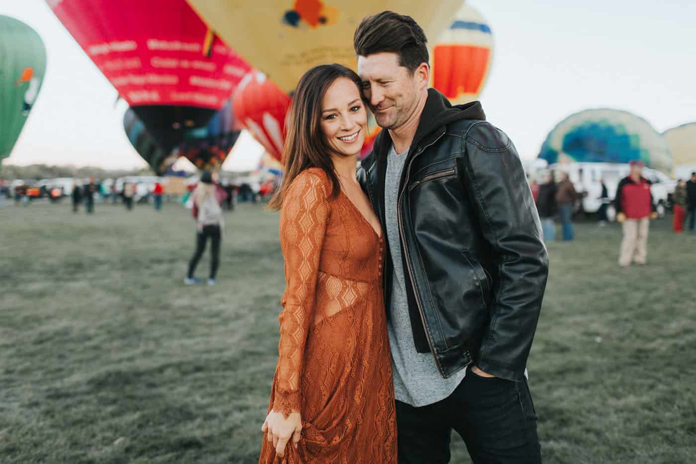 Memorable Photo Locations - Free People styled couple in love at a hot air balloon festival