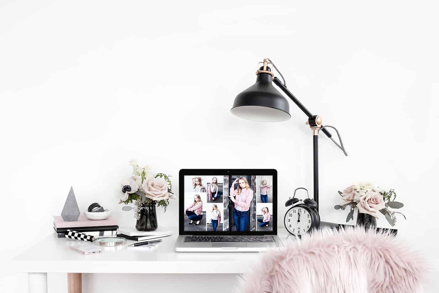 white desktop with pink and black accessories