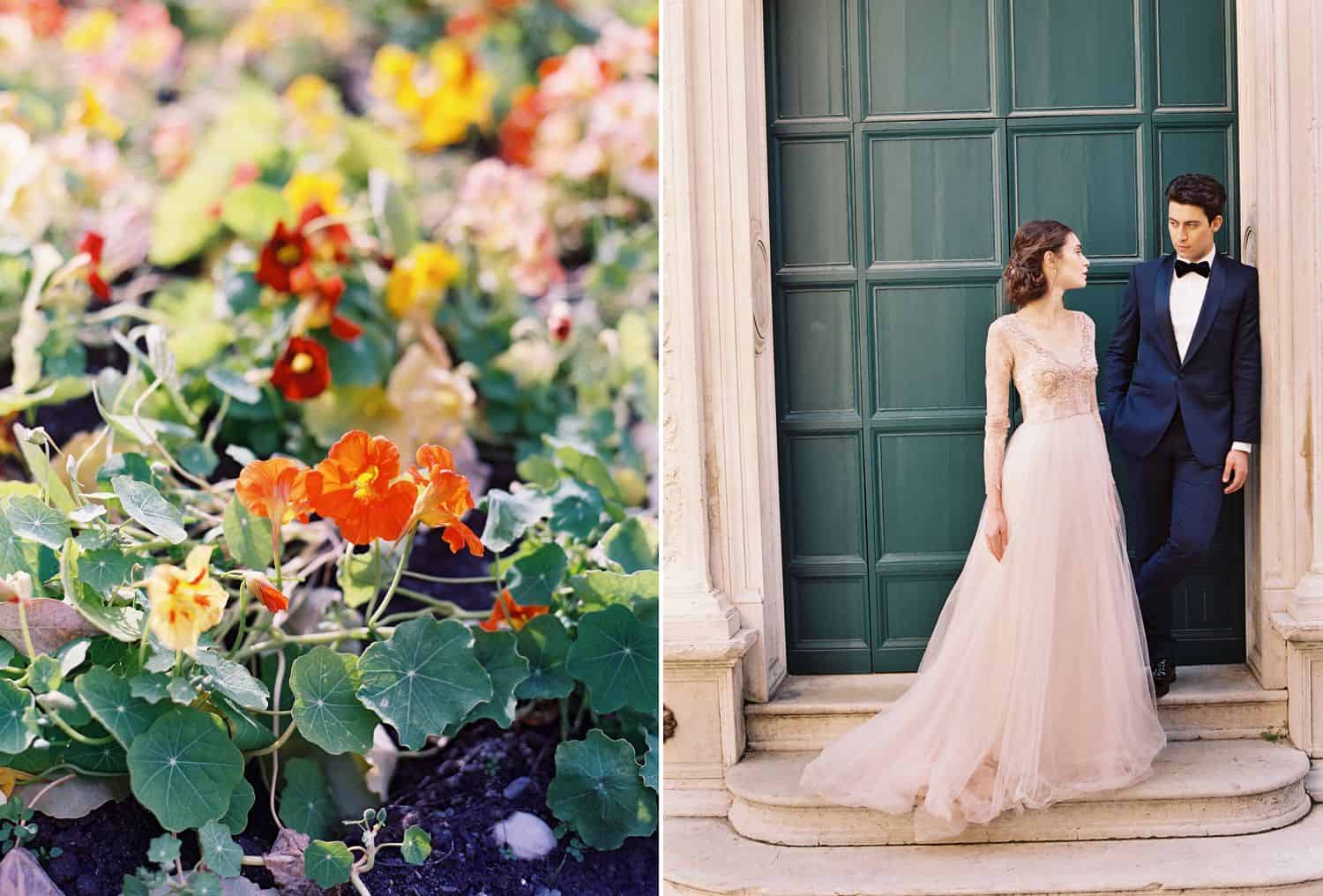 A field of colorful flowers is pictures beside a bride in a pink dress who stands in front of a green door with her groom.